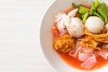 (Yen-Ta-Four) - Thai Style Noodle with assorted tofu and fish ball in Red Soup Royalty Free Stock Photo