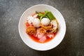 (Yen-Ta-Four) - Thai Style Noodle with assorted tofu and fish ball in Red Soup Royalty Free Stock Photo