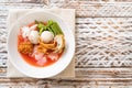 (Yen-Ta-Four) - Thai Style Noodle with assorted tofu and fish ball in Red Soup Royalty Free Stock Photo