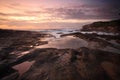 Yena Bay rockshelf low tide at dawn. Royalty Free Stock Photo