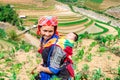 YENBAI, VIETNAM - MAY 16, 2014 - Ethnic mom and her child going to work.