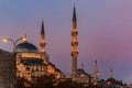 The Yeni Cami or New Mosque illuminated in the morning, Istanbul Turkey, sunrise Royalty Free Stock Photo