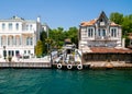 Yenikoy, Istanbul / Turkey - Restaurant yard between abandoned old wooden and luxurious maintained mansions at Bosporus coast