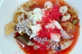 Yentafo Spicy noodle soup,hot and spicy ,with mix seafood, crayfish, shrimp. Asian spicy seafood noodle soup in white bowl on