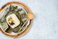 yeonnipbap, korean lotus leaf rice, Glutinous rice, dates, and chestnuts wrapped in a lotus leaf and steamed in a steamer. In the