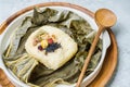 yeonnipbap, korean lotus leaf rice, Glutinous rice, dates, and chestnuts wrapped in a lotus leaf and steamed in a steamer. In the