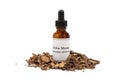 Yerba Mansa tincture and dried root on white