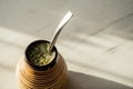 Yerba mate in ceramic matero, bombilla.