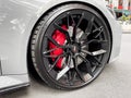 Yerevan, Armenia, April 15, 2023 : Front view of logo of Audi RS7 on alloy wheel. Car exterior details. Tyre and alloy wheel with Royalty Free Stock Photo