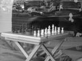 Yerevan Armenia 12.5.2025. A chess board is set up on a folding table in front Royalty Free Stock Photo