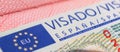 Yerevan, Armenia, December 25, 2023: Closeup Spain visa focusing on the word VISA. Schengen visa stamp background