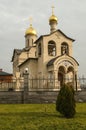 The new white stone Orthodox Church of the Life-giving Cross of the Lord, at the intersection of Admiral Isakov Avenue with Bagrat