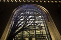 Yerevan, Armenia - March 8, 2023: Brightly lit Ameriabank main office building in the center of Yerevan in the evening.