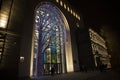 Yerevan, Armenia - March 8, 2023: Brightly lit Ameriabank main office building in the center of Yerevan in the evening.