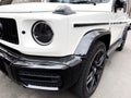 Yerevan, Armenia, March 6, 2023: White Mercedes-Benz G 63 AMG 2023 V8 Biturbo exterior details. Tyre and alloy wheel. Modern Royalty Free Stock Photo
