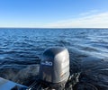 Yerevan, Armenia, October 20, 2023: Modern fishing sport boat with a brand Yamaha 50 FourStroke outboard engine speeding on Sevan Royalty Free Stock Photo