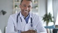 Yes, African-American Doctor Shaking Head to Allow Patient