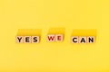 Yes we can message on wooden blocks Royalty Free Stock Photo