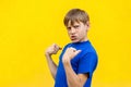 Yes! The happiness beautiful boy in blue t shirt, looking at ca Royalty Free Stock Photo