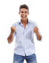 Yes I did it. Portrait of a handsome young man cheering with his fists clenched in excitement. Royalty Free Stock Photo