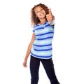 Yes to youth. Studio shot of a young girl giving a thumbs up against a white background. Royalty Free Stock Photo