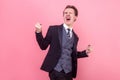 Yes victory! Portrait of crazy enthusiastic extremely happy businessman screaming for joy success. indoor studio shot isolated on Royalty Free Stock Photo