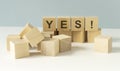 Yes word made of wooden cubes, motivation Royalty Free Stock Photo