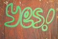 yes wrote on rusty brown background Royalty Free Stock Photo