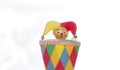 Yester, Narr, clown or man in the box, toy in colorful dress against sky, three in the concept, lower one and upper one