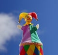 Yester, Narr, clown or man in the box, toy in colorful dress against sky