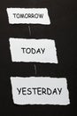 Yesterday Today Tomorrow text on 3 piece of torn paper Royalty Free Stock Photo