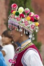 Yi Minority Woman in Traditional Clothes