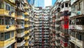 Yick Cheong and Yick Fat old apartment house exterior architecture in Hong Kong city, drone aerial view Royalty Free Stock Photo