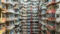 Yick Cheong and Yick Fat old apartment house exterior architecture in Hong Kong city, drone aerial view Royalty Free Stock Photo