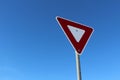 Yield Sign Against Blue Sky Royalty Free Stock Photo