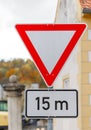 Yield Sign and Distance Marker Royalty Free Stock Photo