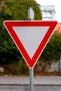 Yield sign giving priority to approaching traffic Royalty Free Stock Photo