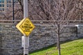 Sign saying: Yield to Pedestrians Please Dismount