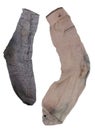 Yin and Yang, male and female concept- two old ragged smelly socks isolated