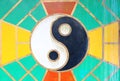 Yin yang sign on the grunge wall of Chinese temple in thailand