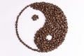 yin yang sign made by coffee beans on white background Royalty Free Stock Photo