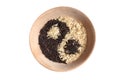 Yin and yang sign made of rice in wooden bowl. Royalty Free Stock Photo