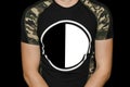 Yin and yang sign symbol black and white contrast round circle on the T-shirt for text and design blank space empty background