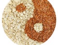 Yin and yang symbol made of flax seeds and whole grain oats isolated on white background Royalty Free Stock Photo