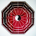 Yin and Yang Symbol on Red and White Gate Royalty Free Stock Photo