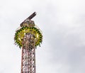 Yo yo carnival ride on cloudy sky background. Oktoberfest, Bavaria, Germany Royalty Free Stock Photo