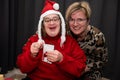 41 yo woman with the Down Syndrome embraced by her 37 yo girl friend during Christmas, Belgium Royalty Free Stock Photo