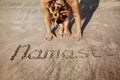 Yoga on the beach with Namaste Royalty Free Stock Photo