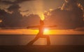 Yoga on the beach Silhouette style.During the time of the earth Royalty Free Stock Photo