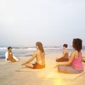 Yoga Class By The Beach Having Breathing Excercise Concept Royalty Free Stock Photo